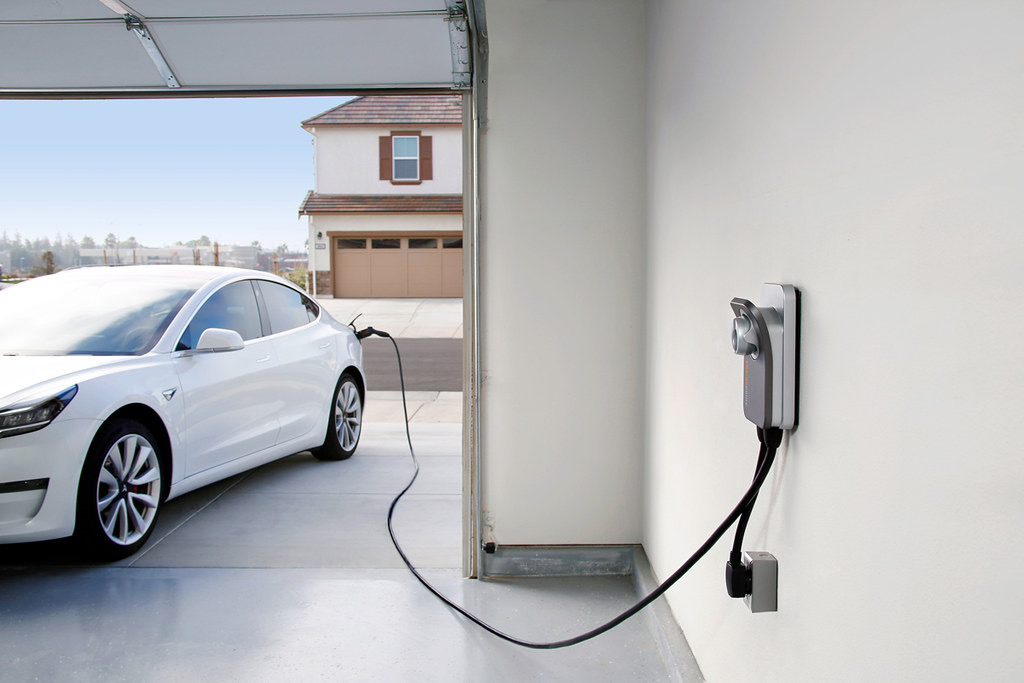 Level 2 EV charger installed in a San Antonio garage on a dedicated 240V circuit by C.S.W. Power Solutions